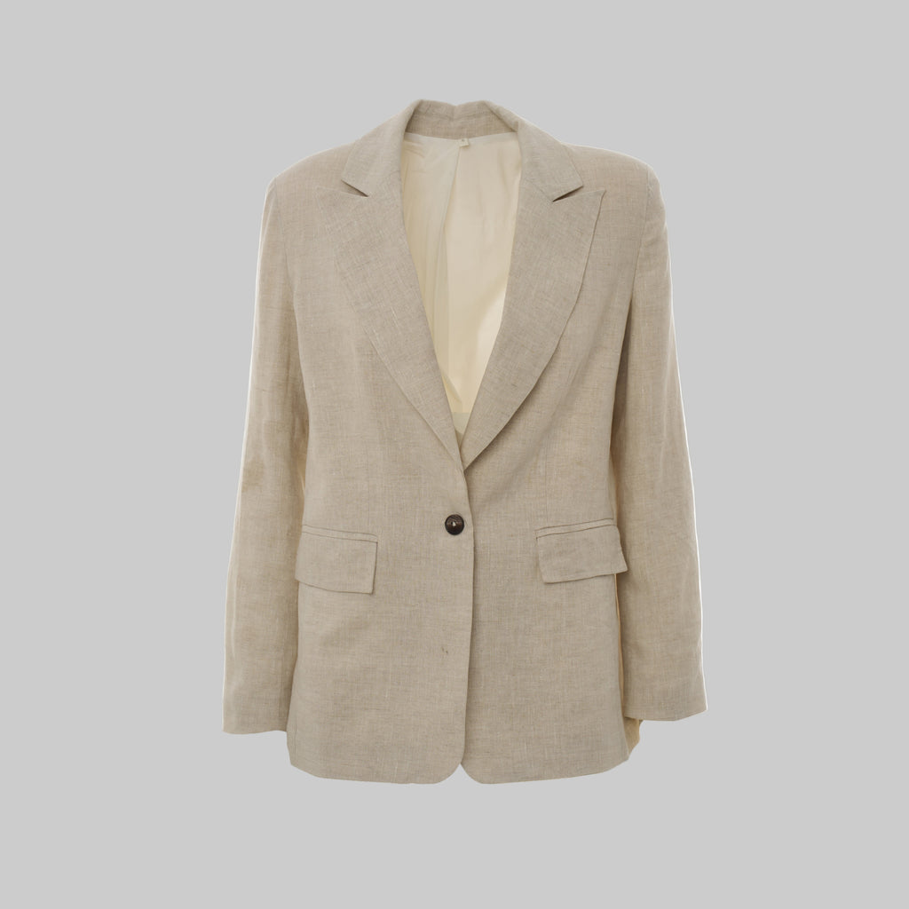 Beige blazer on a light gray background