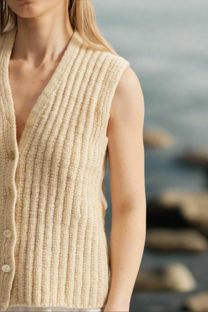 The hand-knitted wool vest