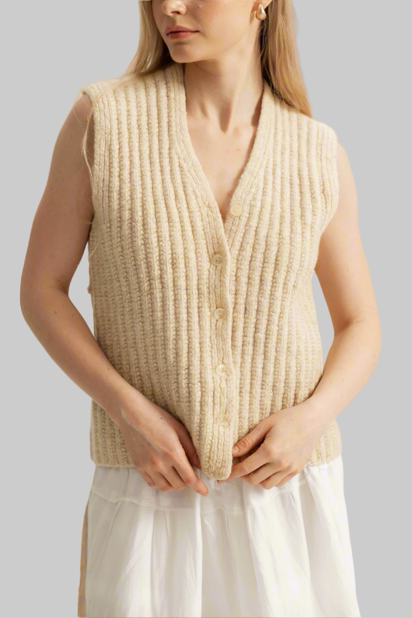 The hand-knitted wool vest