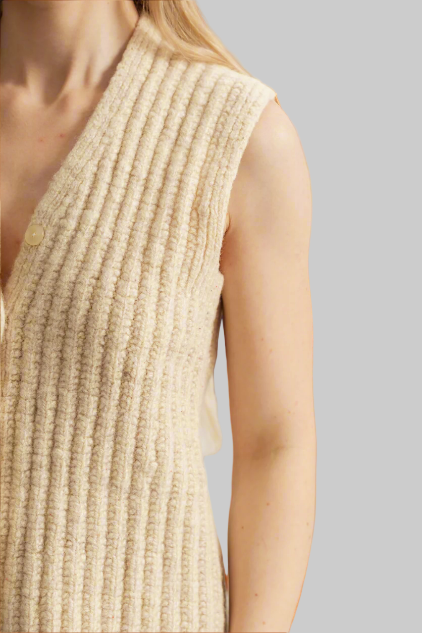 The hand-knitted wool vest