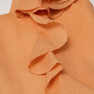Under Flirty Orange natural linen top with ruffles